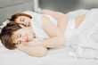 © alfa27 - lovely two beautiful women embracing in the bed. close up photo.night sleep