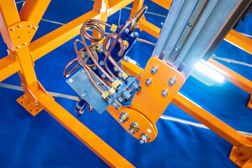 Poster - Robotic industrial welding machine. Welding automation. .Industrial robotics. Manipulation work. Automation in the motor industry.