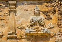 Old Stucco Buddha And Angel Figures On The Outside Of The Maha Chedi Of Wat Chet Yot (Wat Jed Yod) Or Wat Photharam Maha Vihara, The Public Buddhist Temple. Located In Chiang Mai, Thailand.