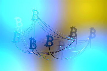 Golden bitcoin signs flying in the air and connected to each other by wire network. Cryptocurrency concept. 3d illustration