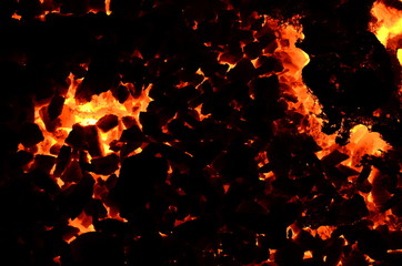 Poster -  The dark background consists of flaming coal anthracite.