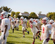 © Cavan Images - Football teenage players (16-17) stretching before practice