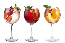 Alcoholic And Non-alcoholic Cocktails With Mint, Fruits And Berries On A White Background. Three Cocktails In Glass Goblets.