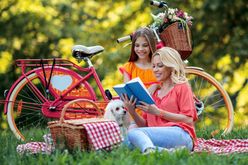 Wall Mural - Mother with daughter in the park