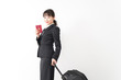 © maroke - 海外出張に行く若いビジネスウーマン