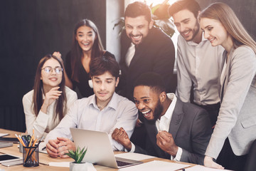 Aufkleber - Happy business team celebrate successful project looking at laptop