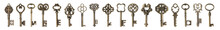 Set Of Bronze Vintage Ornate Keys On White Background