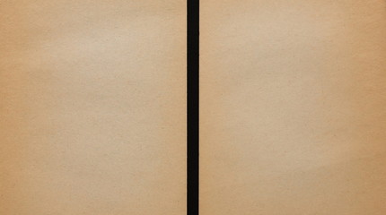 Brown paper sheets isolated on black background