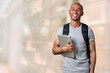 © BillionPhotos.com - Male student with  backpack on  background