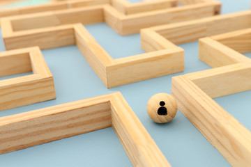 concept photo of standing in a maze and looking for the best way or solution