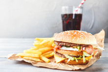 Double Cheeseburger With Fries. Takeaway Lunch, Fast Food Restaurant, Fast Food Menu. Light Background, Selective Focus And Copy Space