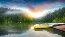Boats On Majestic Mountain Lake Lacul Rosu Or Red Lake Or Killer Lake