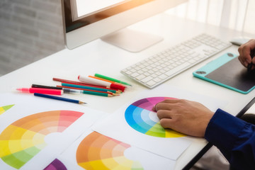 Leinwandbilder - Designers working with color swatch samples for design web in workplace at office. ideas style networking concept.
