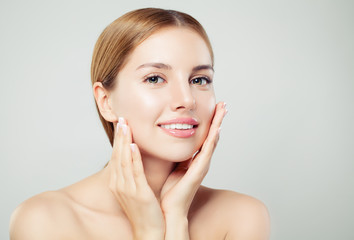pretty woman looking at camera. beautiful face with healthy clear skin, natural makeup and natural e