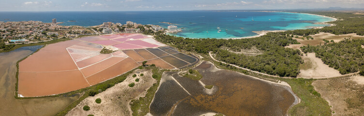 Wall Mural - Colonia Sant Jordi, Mallorca Spain. Amazing drone aerial landscape of the village, the pink salt flats and the charming beach Estanys