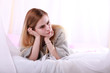 © alexkich - Girl with blond hair and gray sweater