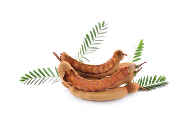 Wall Mural - Dried tamarind and leaves isolated on a white background