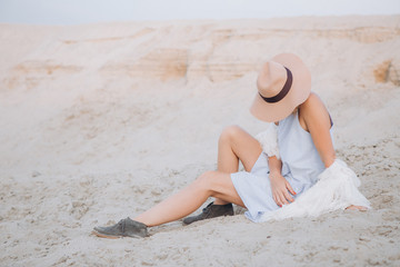 girl hat solitude desert sand outside sunny