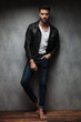 © Viorel Sima - relaxed sexy young man in leather jacket and bare feet