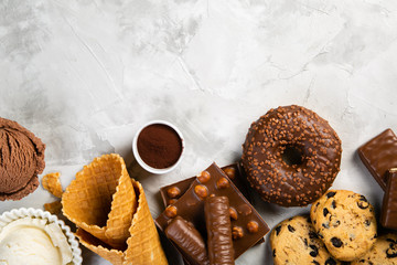 Wall Mural - Selection of chocolate sweets - donut, ice cream, cookies, top view