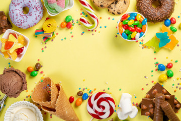 Wall Mural - Selection of colorful sweets - chocolate, donuts, cookies, lollipops, ice cream top view