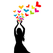 Silhouette Of Woman With Colored Hearts In Her Hands