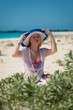 © lookproduction - Portrait of young blonde woman at summer sunny day on a beach