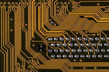 Fototapete - Printed circuit board showing surface mount components. Big close up.