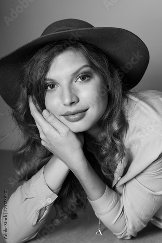 Black And White Portrait Of Beautiful Smiling Girl With Curly Hair