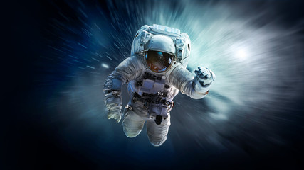 Wall Mural - astronaut in outer space. elements of this image furnished by nasa