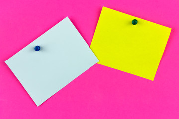 three color stickers on a pink background, copy spaсe