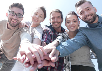 Wall Mural - College Students Teamwork Stacking Hand Concept