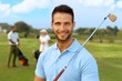 © nyul - Closeup portrait of handsome golfer