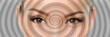 Hypnosis spiral over eyes of woman hypnotized closeup banner panorama. Asian girl portrait background.