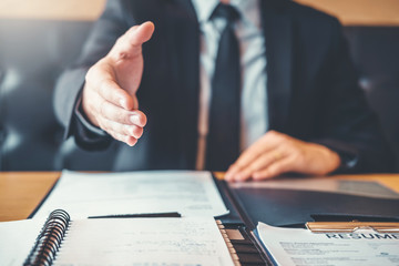 Shaking hands Business people greeting new colleagues while job interviewing shaking hands meeting Planning after during job interview Concept