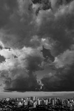 Beautiful View Of The Dramatic Dark Stormy Sky In Black And White. The Rain Is Coming Soon. Pattern Of The Clouds Over City. Very Heavy Rain Sky In Sao Paulo City, Brazil South America. 