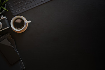 Dark leather desk minimal photographer workspace, Top view shot