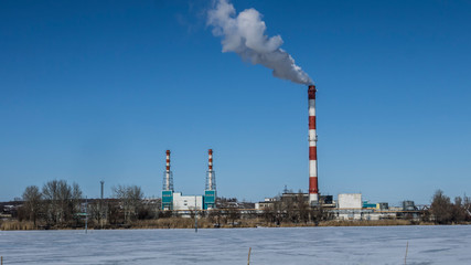 enterprise chimneys against a clear blue sky