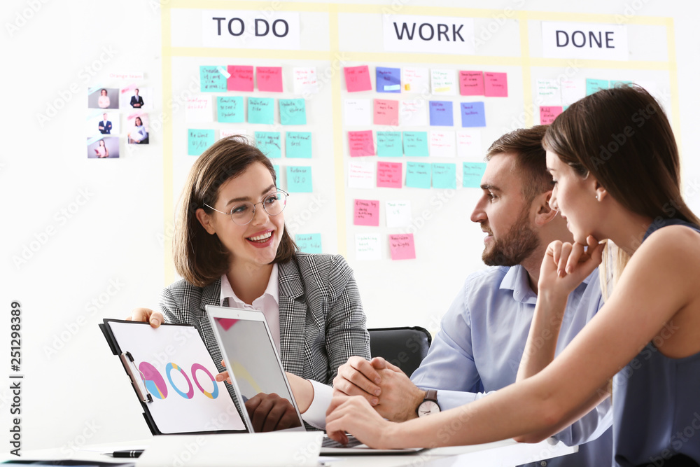 Young business people at meeting in office