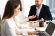 © Pixel-Shot - Young business people at meeting in office