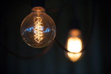 Garland bulbs in the dark, the interior of the cafe