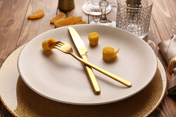 Beautiful table setting on wooden background