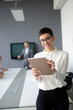 © NDABCREATIVITY - Entrepreneurs and business people conference in modern office