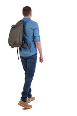 Canvas Print - back view of walking  man  with green bag.