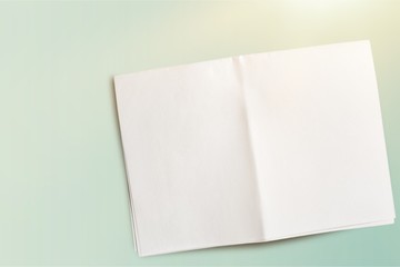 Poster - Close up of a crumpled unfolded piece of paper on white background