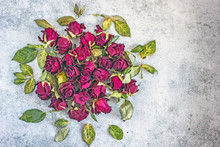 Dried Red Rose Buds, Dried Roses With Leaves On A Stone Background, Dried Rose Buds In The Form Of An Ornament