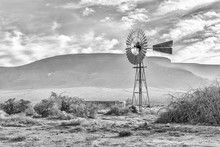 Landscape, With Windmill And Dam, In The Tankwa Karoo. Monochrome
