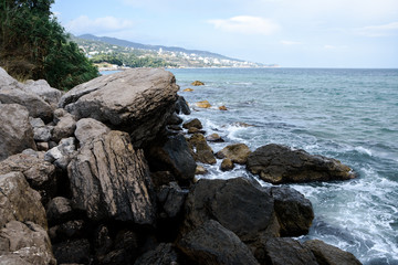 Sea waves, beating on the stones. Noisy sea. Coast of the Black Sea