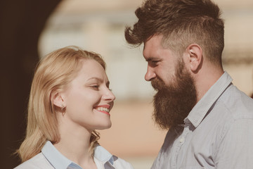 Wall Mural - Happy to be in love. Couple in love on summer day. Loving couple of woman and hipster dating outdoor. Feeling love and romance. Sensual woman and bearded man enjoy romantic date