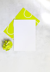 Blank white sheet with tennis ball template background top view